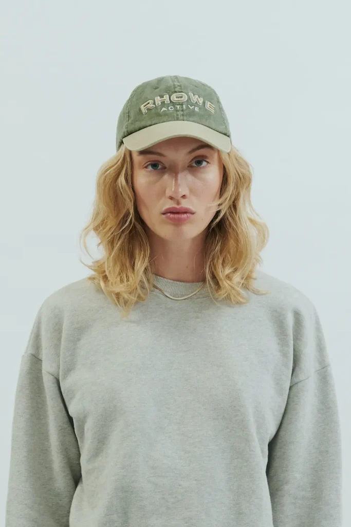 Rhowe Active Everyday Cap in sage colour, with logo on the front with a vintage washed look